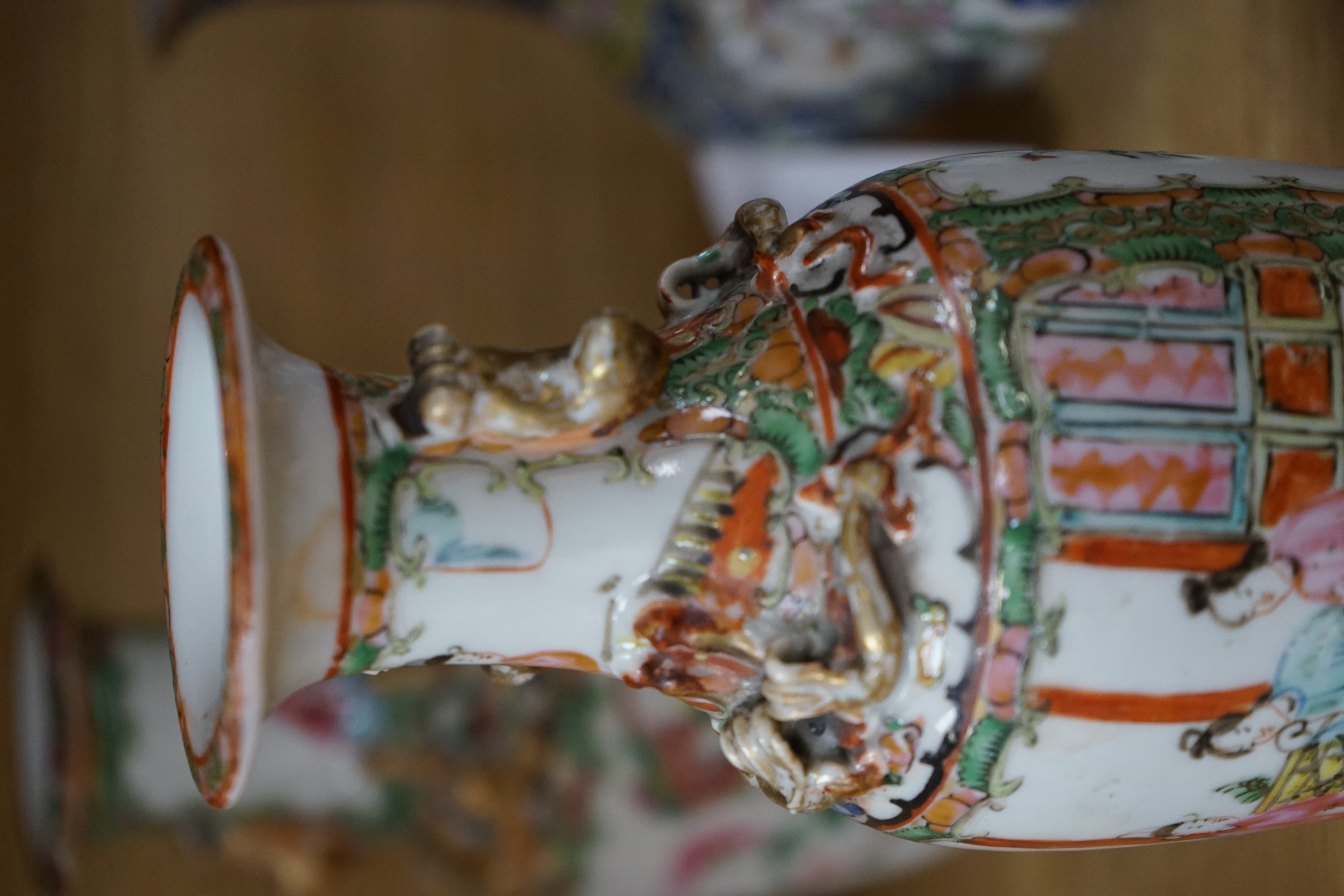 Four 19th century Chinese famille rose vases, 21cm